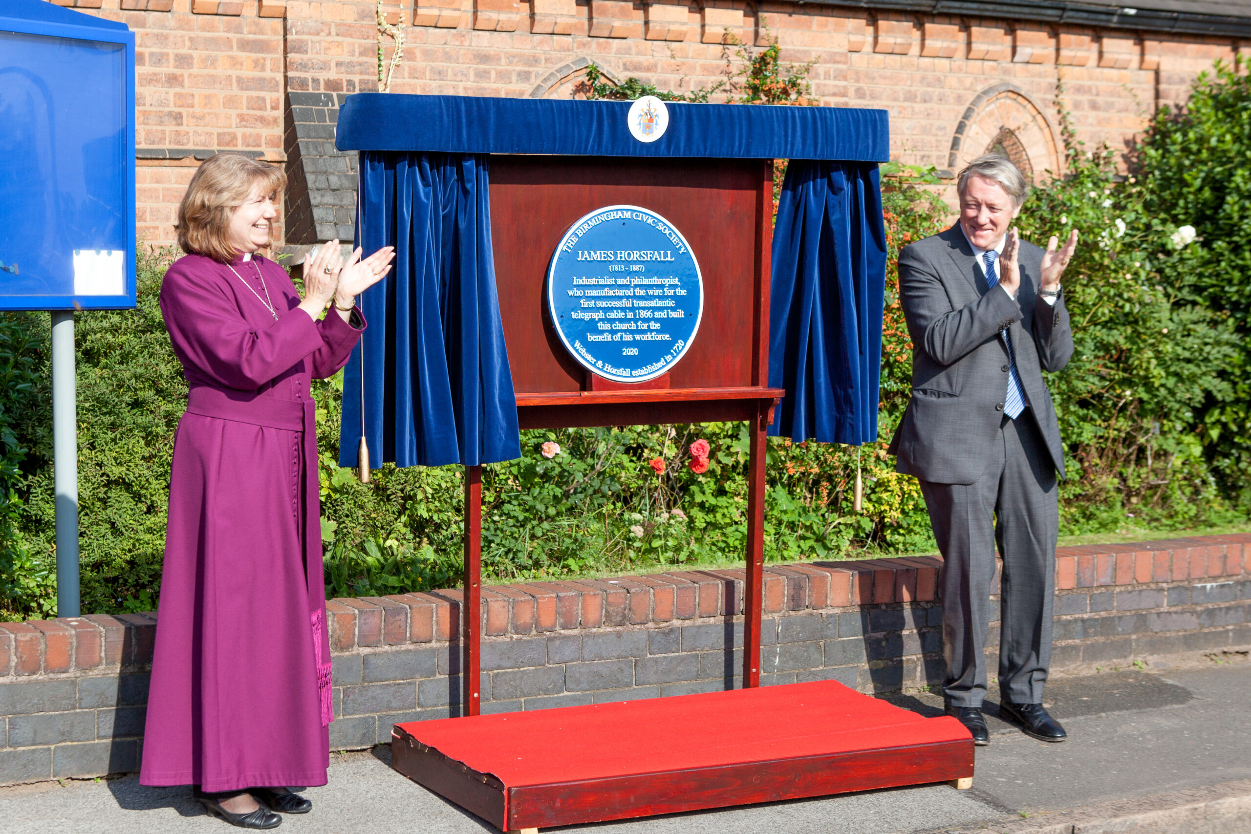 The Bishop of Aston, The Right Reverend Anne Hollingshurst, and Charles Horsfall, Chairman of Webster & Horsfall unveil the Blue Plaque